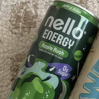 Nello Energy can against a beige carpet