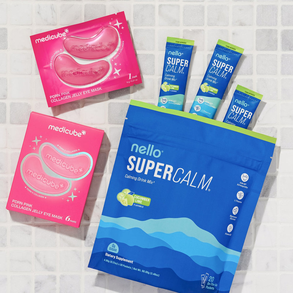 Nello Supersleep with the medicube Collagen Night Wrapping Mask on white tile